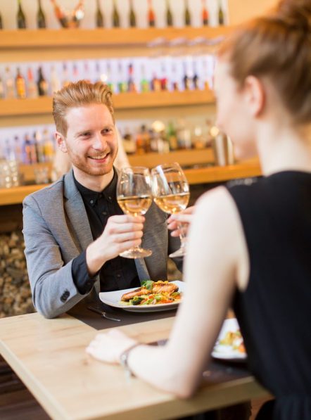 Young couple in the restaurant and have a romantic dinner